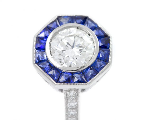 , 1.01CT Round Brilliant Cut Diamond with Sapphire Halo in Platinum